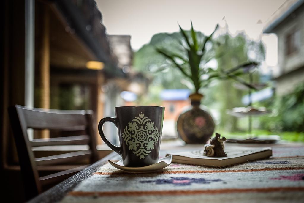 Mingtang Garden Cottage 名堂花园度假屋 Pokhara Bagian luar foto