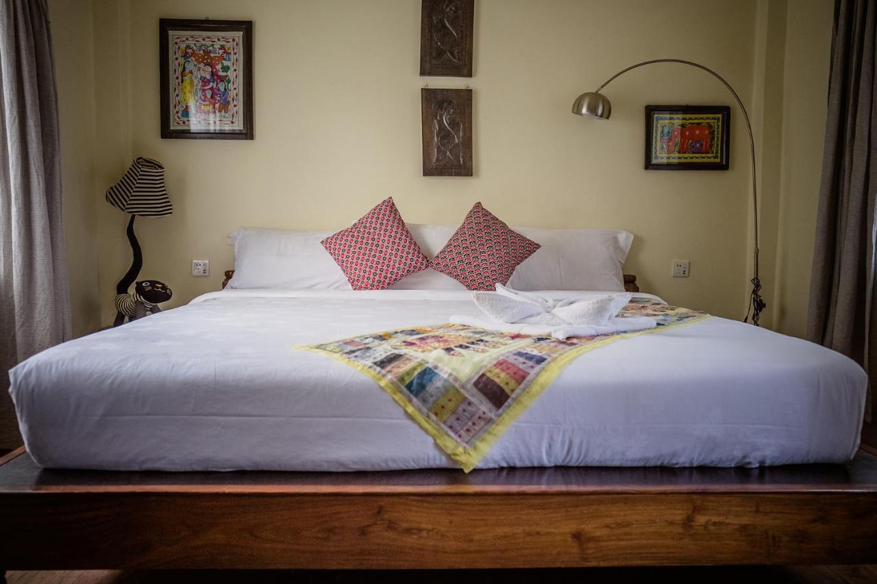 Mingtang Garden Cottage 名堂花园度假屋 Pokhara Bagian luar foto