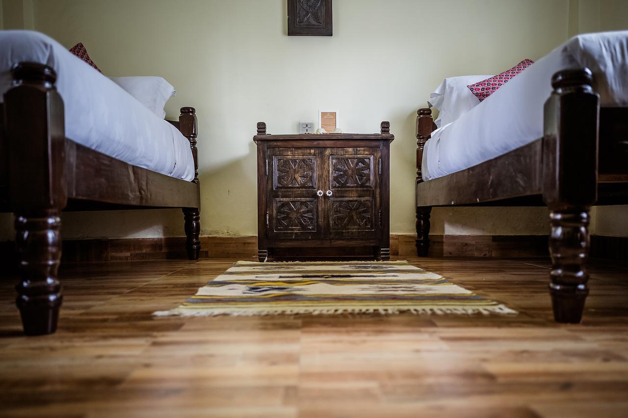 Mingtang Garden Cottage 名堂花园度假屋 Pokhara Bagian luar foto