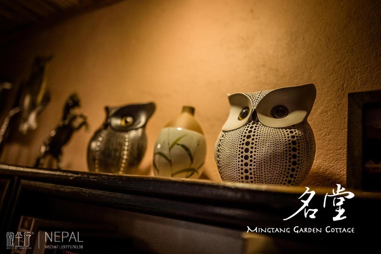 Mingtang Garden Cottage 名堂花园度假屋 Pokhara Bagian luar foto
